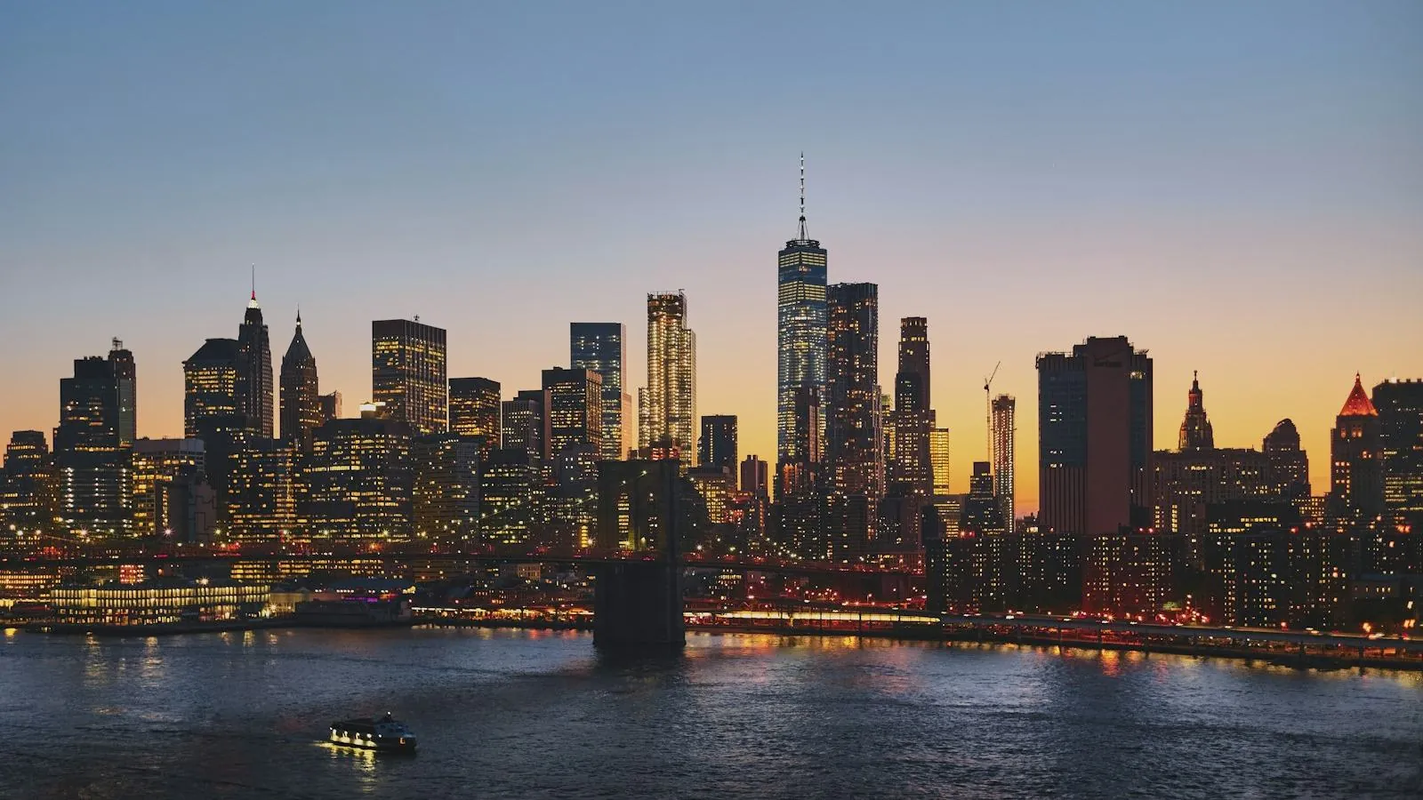 Lower Manhattan and the Brooklyn Bridge at dusk